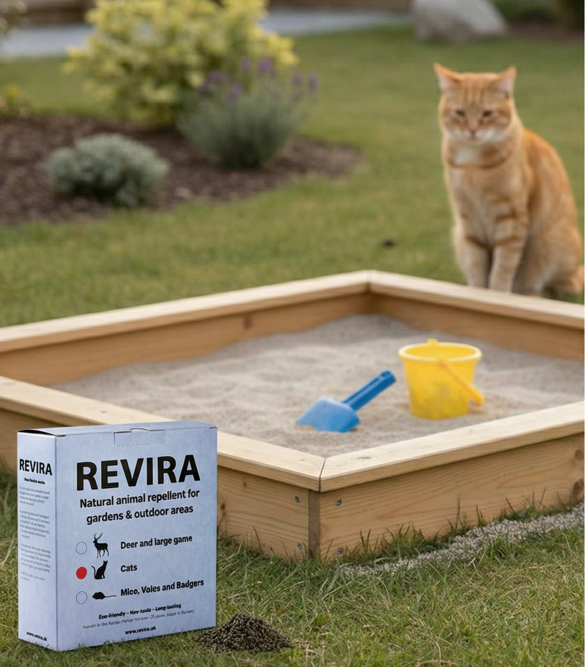 cat deterrent in front of sandbox in garden